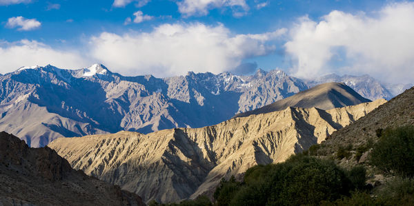 Panoramic view of mountains against sky