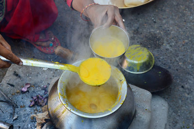 High angle view of person preparing food