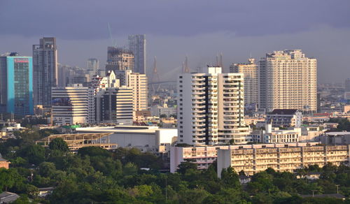 Buildings in city against sky