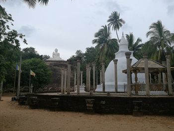 View of historical building against cloudy sky