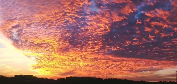 Scenic view of dramatic sky during sunset