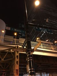 Low angle view of illuminated building at night