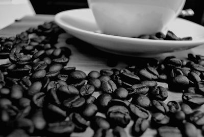 Close-up of coffee beans on table