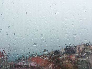 Full frame shot of wet window in rainy season