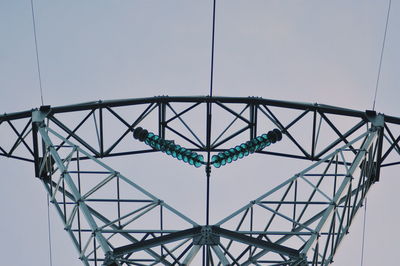 Low angle view of cables against clear sky