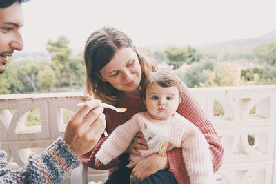 Happy mother and daughter outdoors