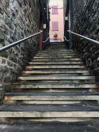 Low angle view of staircase leading towards building