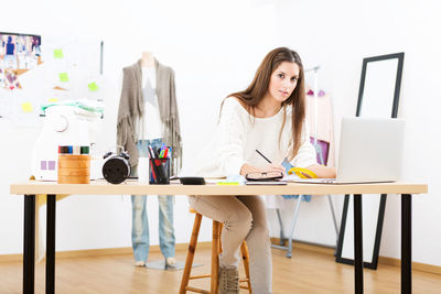 Woman working on table