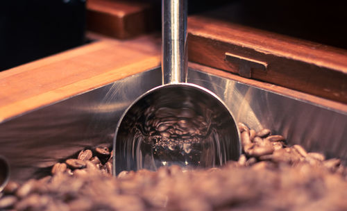 Close-up of water falling on table