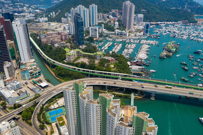 High angle view of harbor and cityscape 