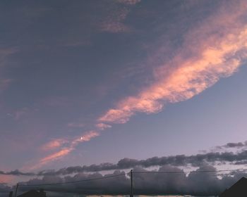 Low angle view of dramatic sky at sunset