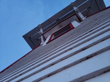 Low angle view of building against blue sky