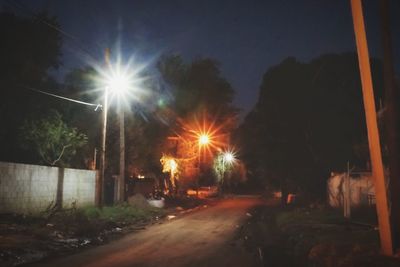 Illuminated street light at night