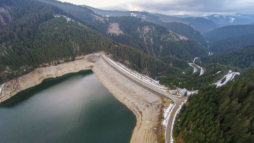 High angle view of river amidst mountains