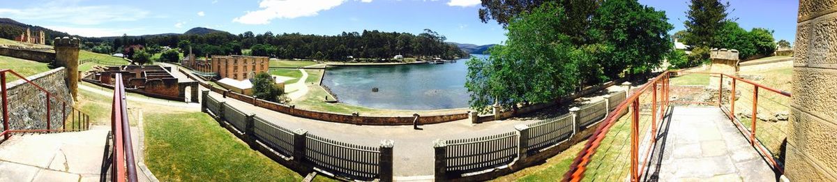 High angle view of trees by lake against sky