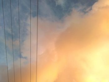 Low angle view of dramatic sky during sunset