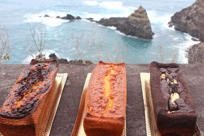 High angle view of cakes against sea