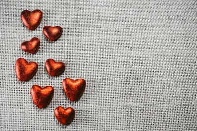 Directly above shot of heart shape over white background