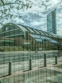 Low angle view of modern building against sky