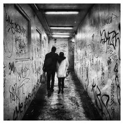 Full length of woman walking on road