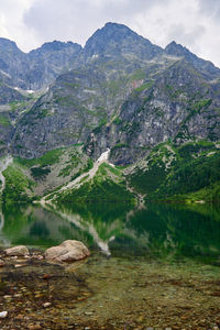 Mountains range near beautiful lake. tatra national park in poland. morskie oko or sea eye lake