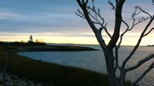 Scenic view of sea at sunset