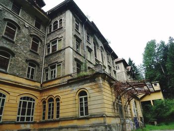 Low angle view of old building against sky