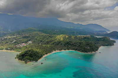 Scenic view of bay against sky