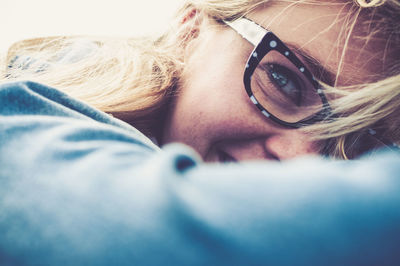 Close-up of girl using mobile phone