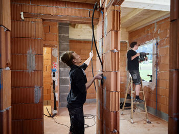 Side view of a woman working