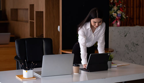 Woman working on table