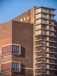 Low angle view of residential building against sky