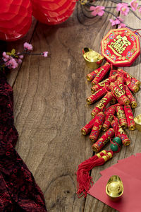 Good luck firecrackers chinese new year or lunar new year 2021 decoration on wooden table on table 