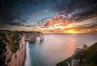Scenic view of sea against sky during sunset