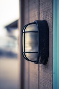 Close-up of lighting equipment on wall