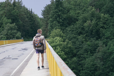 Rear view of a man on motorcycle