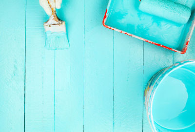 Close-up of blue door and paint