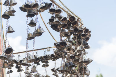 Low angle view of decoration hanging against sky