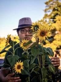 Close-up of sunflower against yellow flowering plants