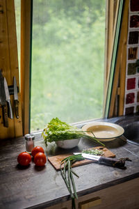 Healthy lifestyle. man cooking green salad of romaine lettuce. healthy food concept