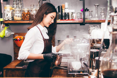 Woman standing in restaurant