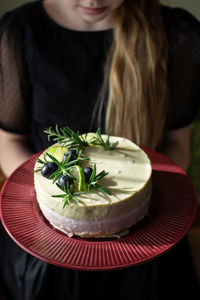 Midsection of woman having food