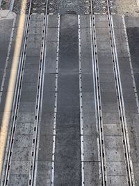 High angle view of railroad tracks on road