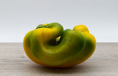 Close-up of green bell peppers on table