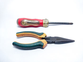 High angle view of machine part against white background