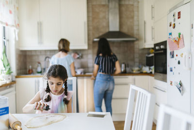 Girl preparing dough