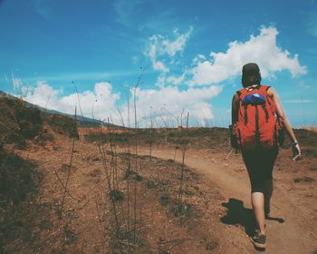 Silhouette of woman standing on landscape