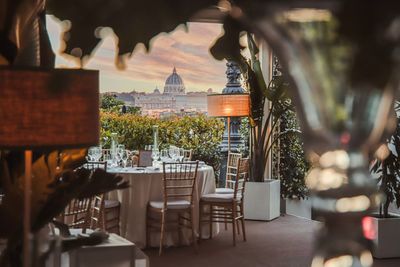 Empty chairs and tables in cafe