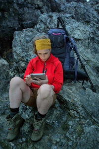 Man sitting on rock