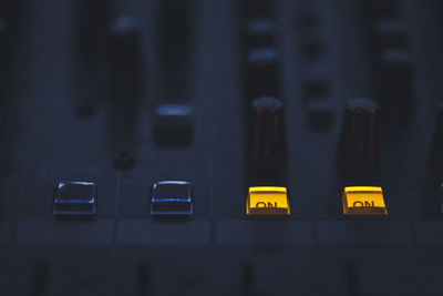 Close-up of sound mixer buttons